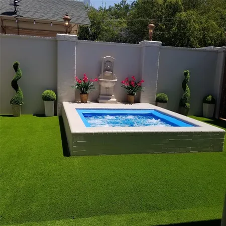a view of an outdoor space and swimming pool