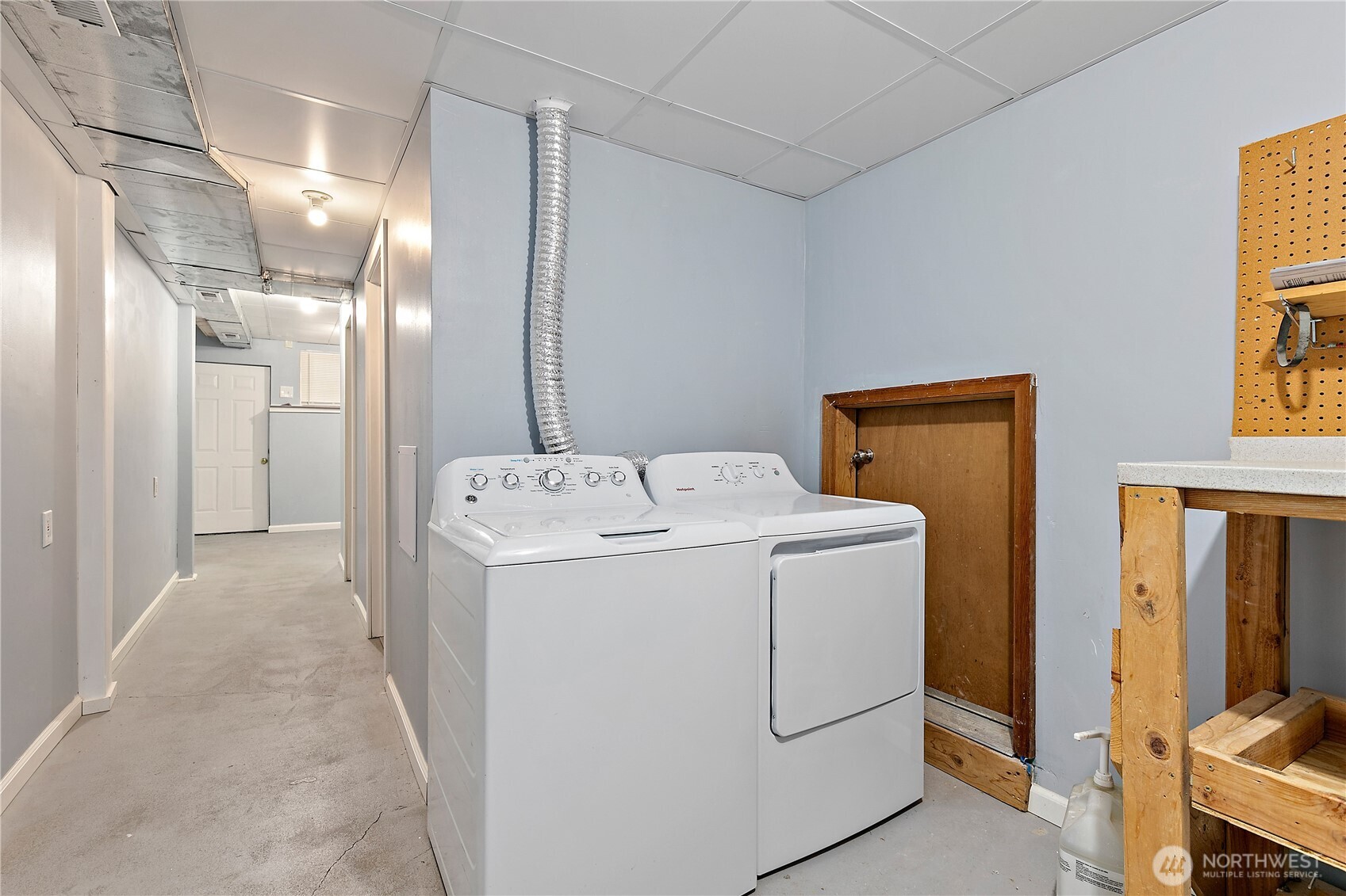 9880 Fredrickson Road Northwest Bremerton, WA 98311 - Photo 21 of 28 a view of storage and utility room with washer and dryer