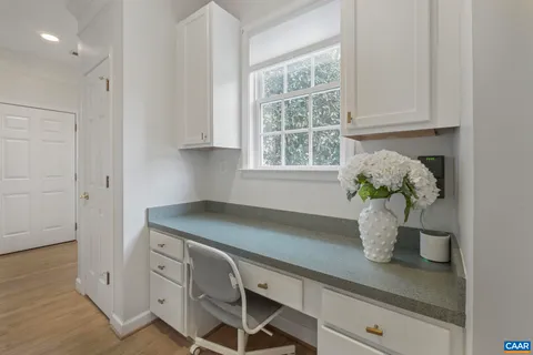 a bed room with a bed and a view of bedroom