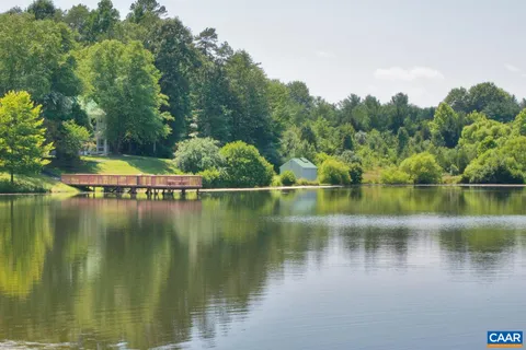 a picture of a bench in front of a building