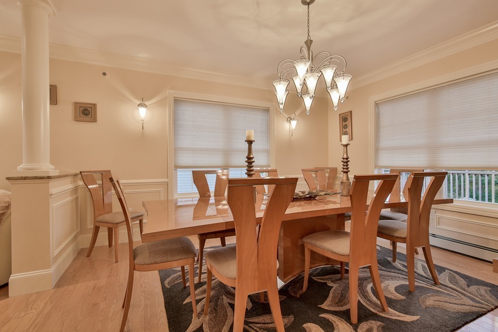 29 Hilltop Avenue Saugus, MA 01906 - Photo 19 of 30 a view of a dining room with furniture and wooden floor