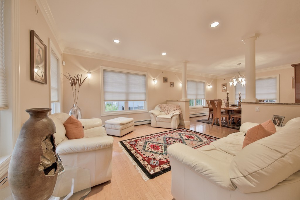 29 Hilltop Avenue Saugus, MA 01906 - Photo 20 of 30 a living room with furniture and a large window