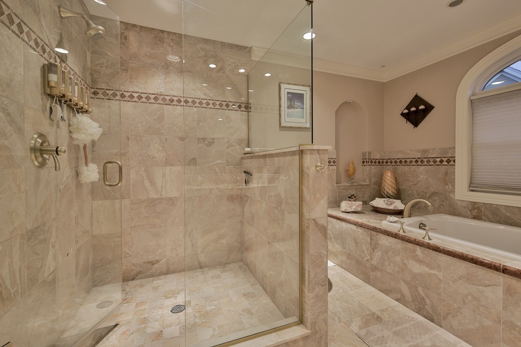 29 Hilltop Avenue Saugus, MA 01906 - Photo 27 of 30 a bathroom with a granite countertop sink a mirror and shower