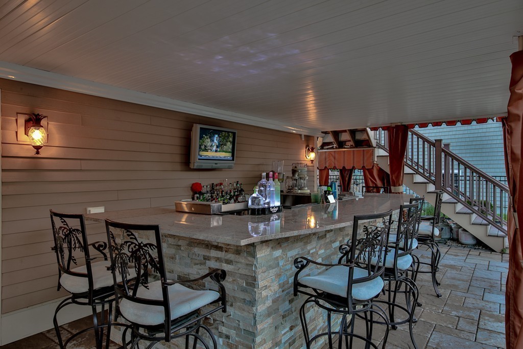 29 Hilltop Avenue Saugus, MA 01906 - Photo 8 of 30 a dining room with furniture and a potted plant
