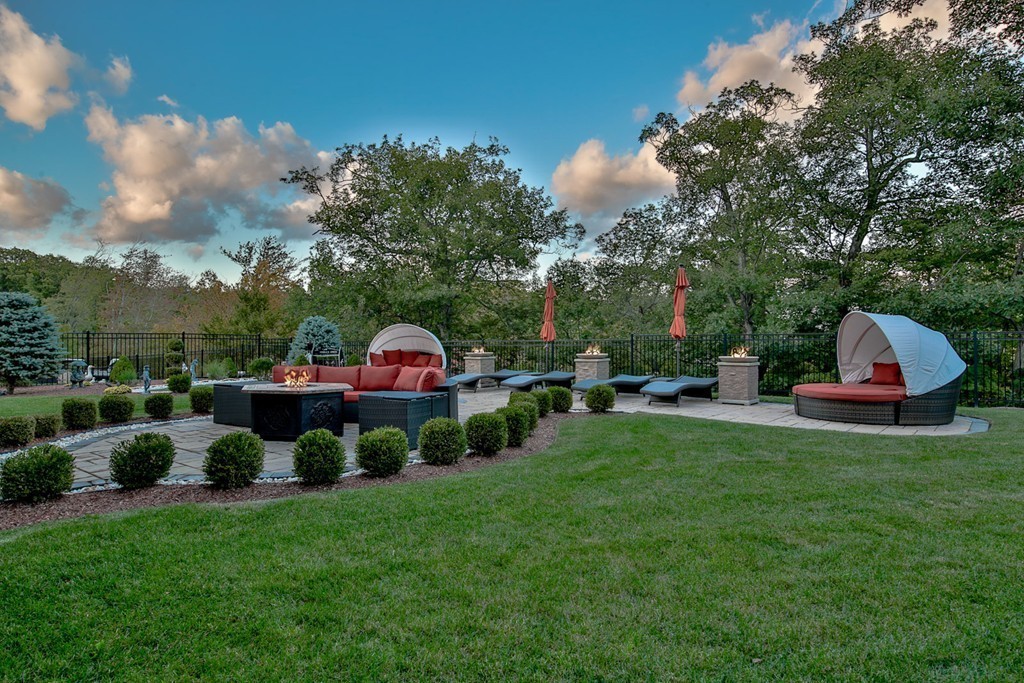 29 Hilltop Avenue Saugus, MA 01906 - Photo 9 of 30 a view of a house with a yard and sitting area