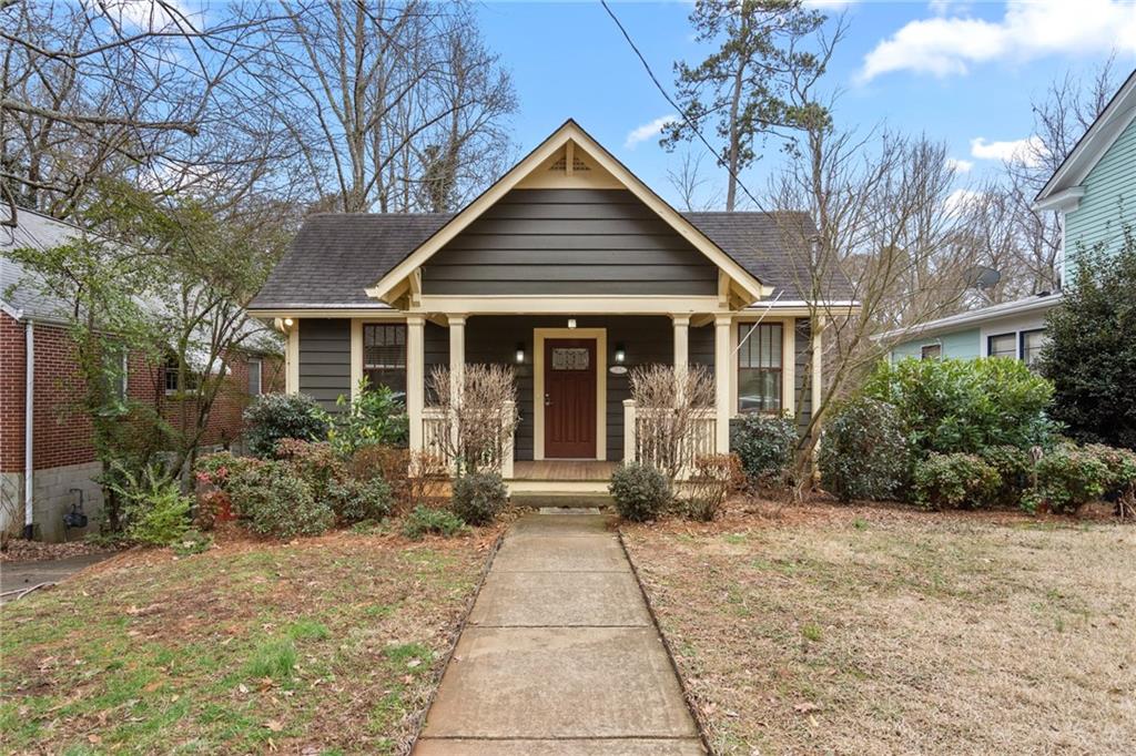 228 West Davis Street Decatur, GA 30030 - Photo 1 of 1 a front view of a house with garden