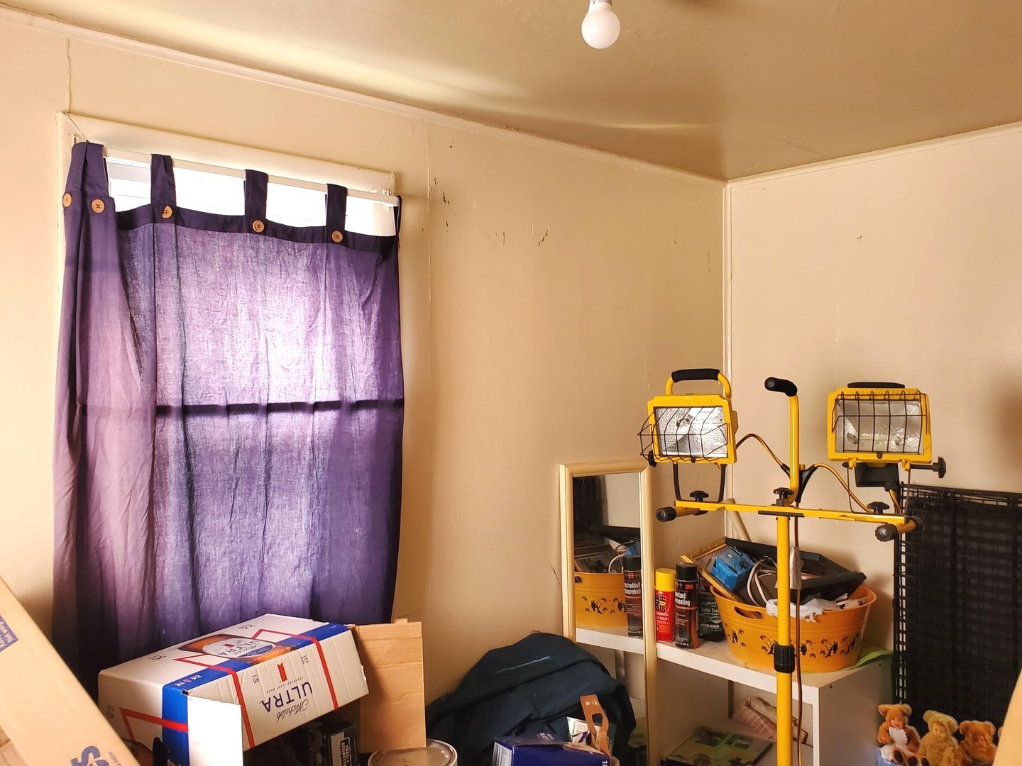316 1/2 Prairie Street Ottawa, IL 61350 - Photo 12 of 13 a view of a room with rack and furniture