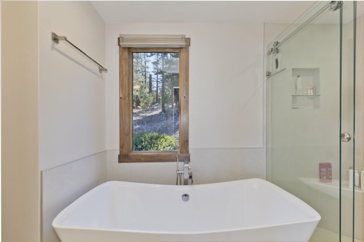 670 John Muir Road, Unit 1 Mammoth Lakes, CA 93546 - Photo 26 of 50 Full bath with a freestanding bath and a stall shower
