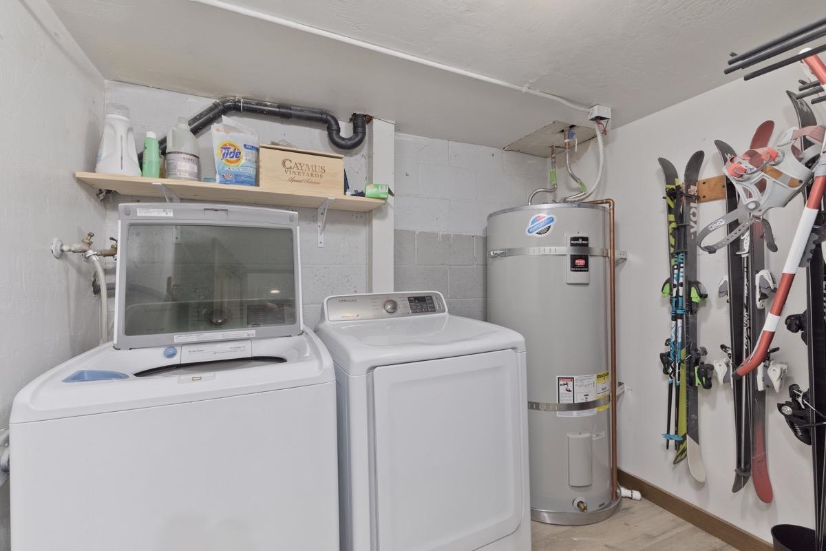 670 John Muir Road, Unit 1 Mammoth Lakes, CA 93546 - Photo 32 of 50 Laundry area with separate washer and dryer and water heater