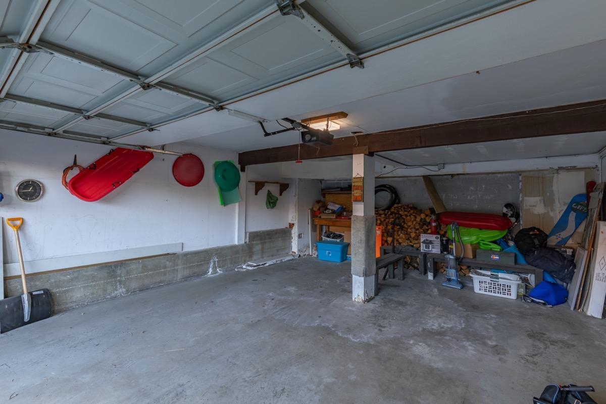 670 John Muir Road, Unit 1 Mammoth Lakes, CA 93546 - Photo 48 of 50 Garage featuring a garage door opener