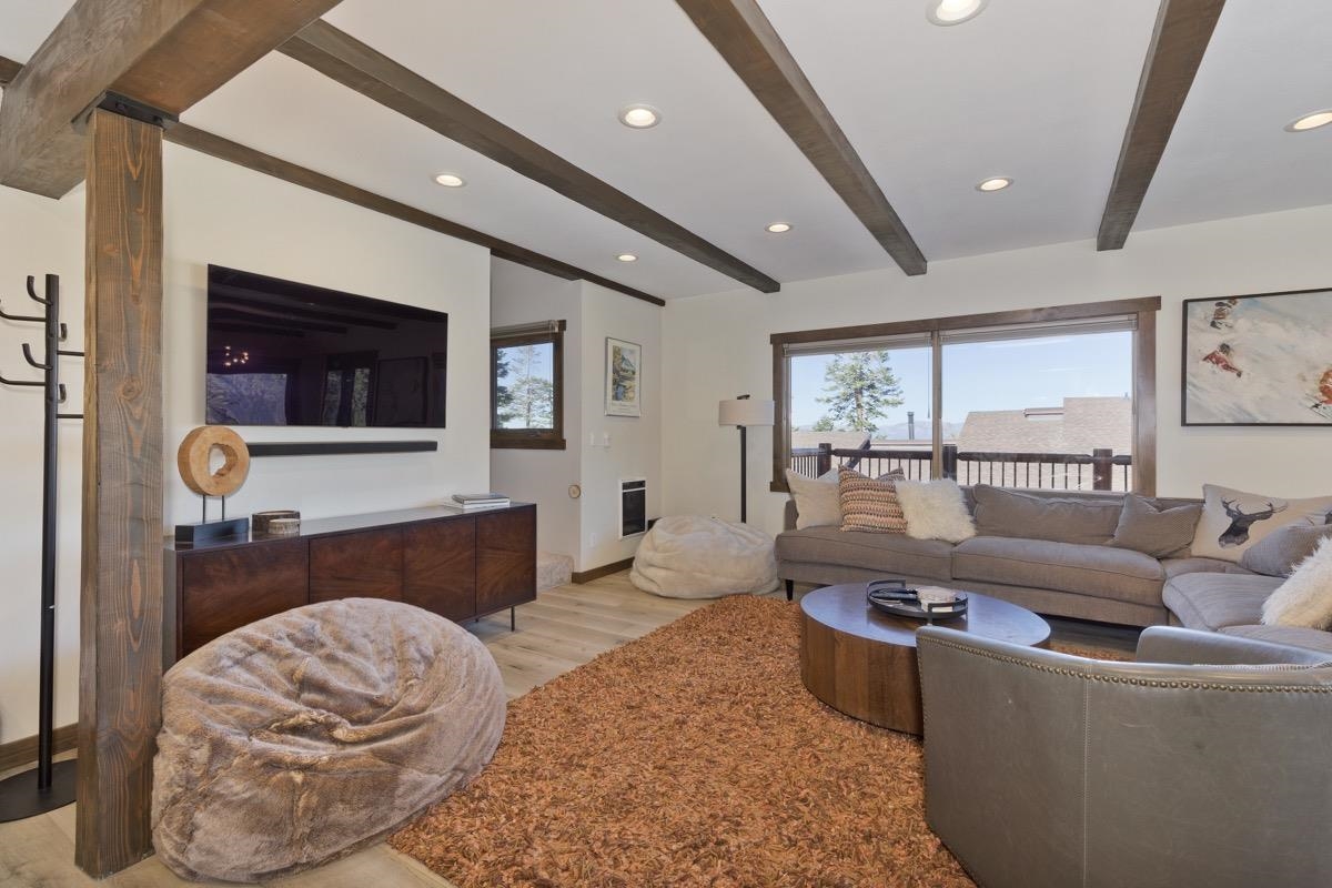 670 John Muir Road, Unit 1 Mammoth Lakes, CA 93546 - Photo 5 of 50 Living room featuring recessed lighting, light wood finished floors, and beam ceiling