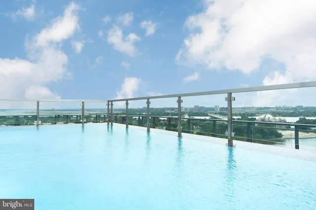 a view of ocean with a big yard