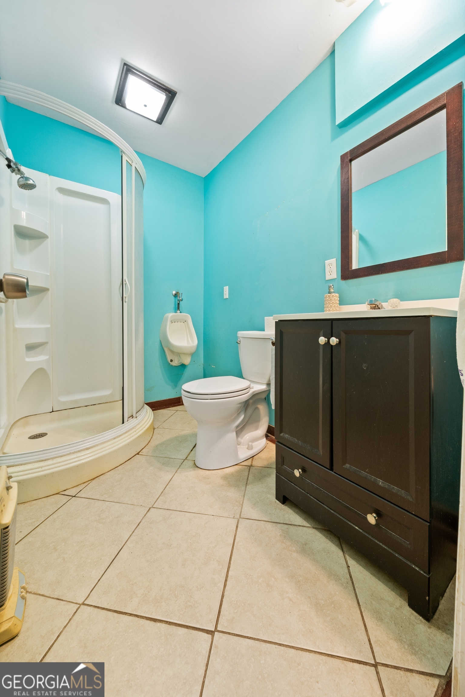 3719 County Road 88 Delta, AL 36258 - Photo 18 of 36 a bathroom with a sink a toilet and shower