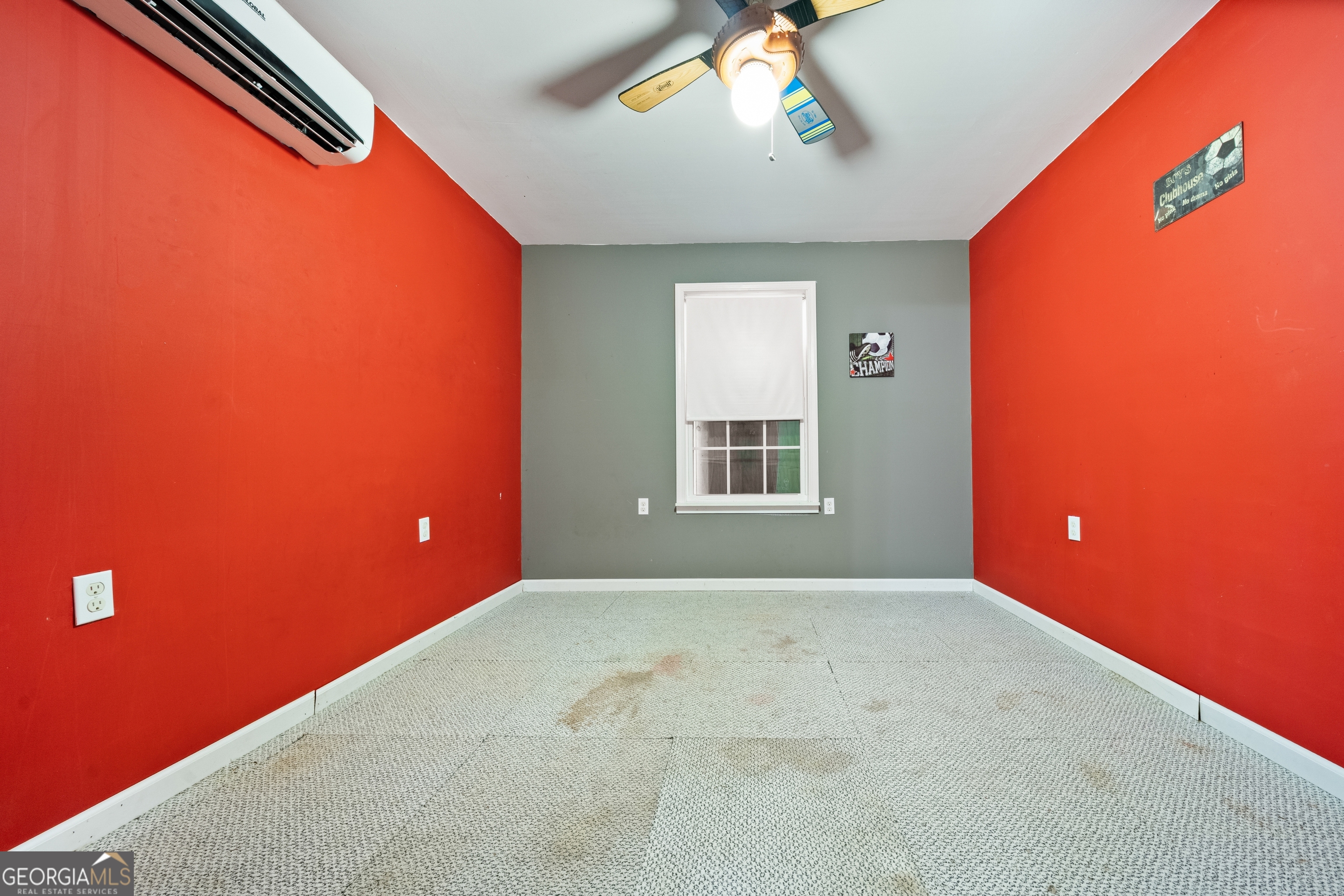 3719 County Road 88 Delta, AL 36258 - Photo 22 of 36 an empty room with windows and chandelier fan