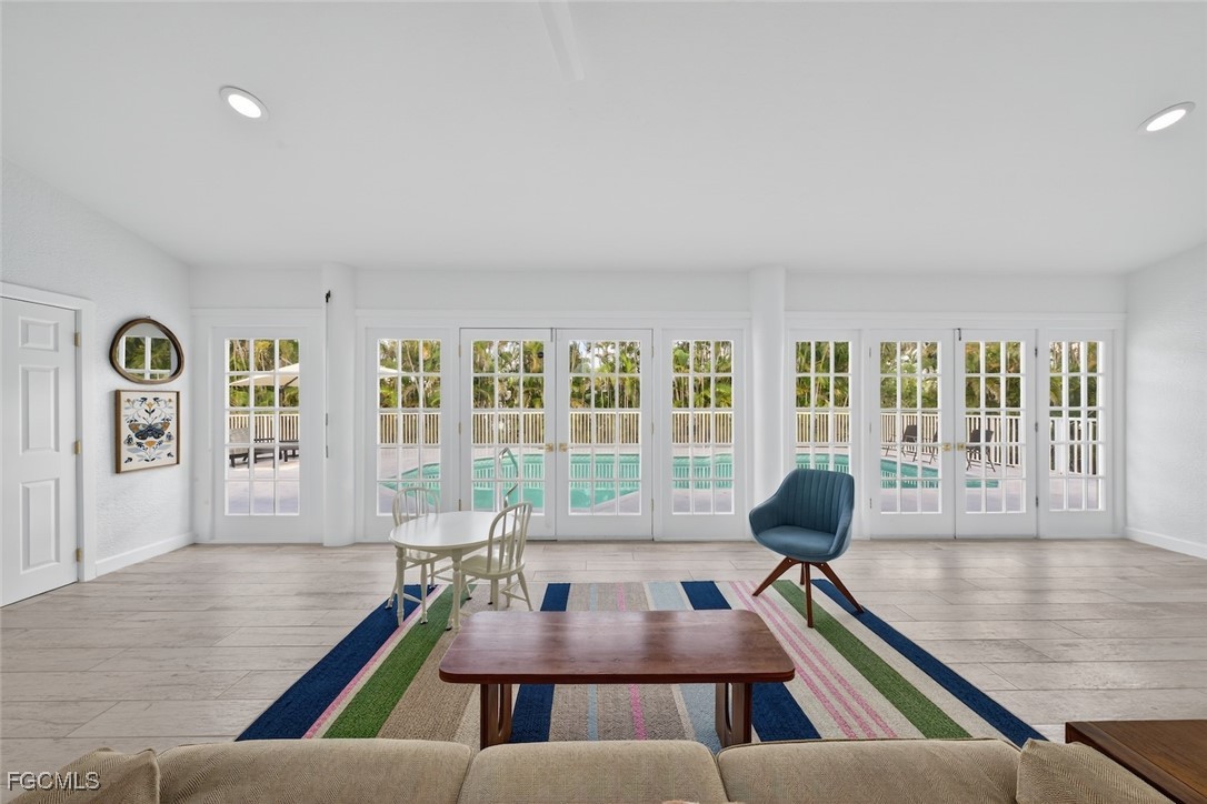 13570 Harbour Ridge Drive Fort Myers, FL 33908 - Photo 20 of 50 a living room with furniture and a large window
