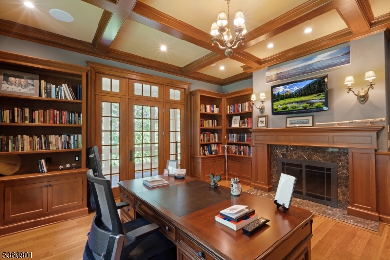 4 Rainetree Ridge Mendham Township, NJ 07945 - Photo 13 of 49 a living room with furniture and a fireplace