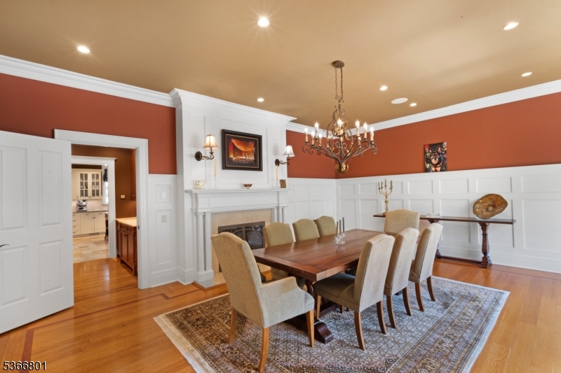4 Rainetree Ridge Mendham Township, NJ 07945 - Photo 19 of 49 a view of a dining room with furniture and wooden floor