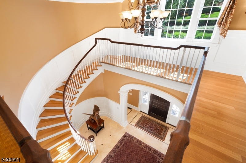 4 Rainetree Ridge Mendham Township, NJ 07945 - Photo 21 of 49 a view of entryway with wooden floor