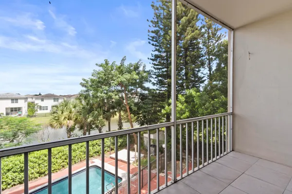 a view of a balcony with city view