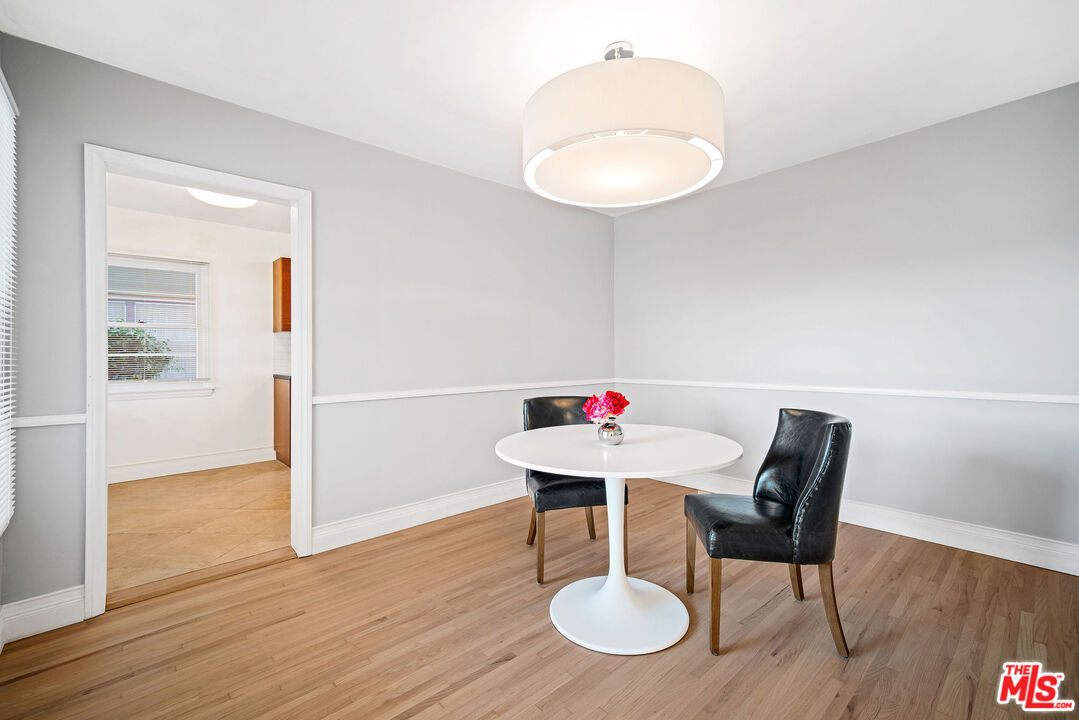 1924 Armacost Avenue Los Angeles, CA 90025 - Photo 13 of 33 a table and chairs in a room