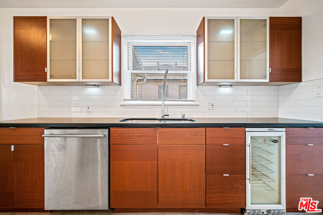 1924 Armacost Avenue Los Angeles, CA 90025 - Photo 18 of 33 a bathroom with a sink and a mirror