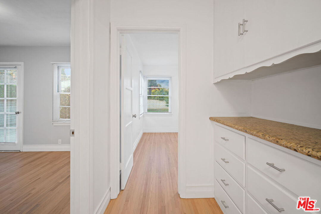 1924 Armacost Avenue Los Angeles, CA 90025 - Photo 20 of 33 a view of a kitchen with wooden floor