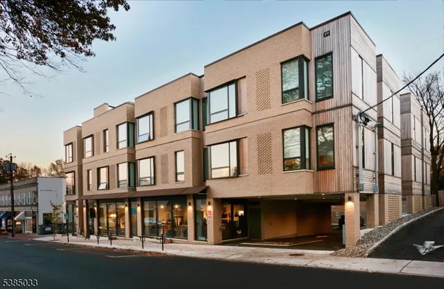 a view of a building with a street