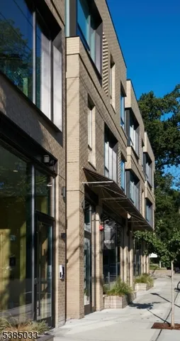 a view of a building with a street