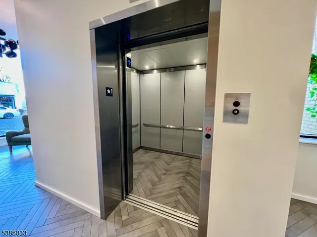 an empty room with wooden floor