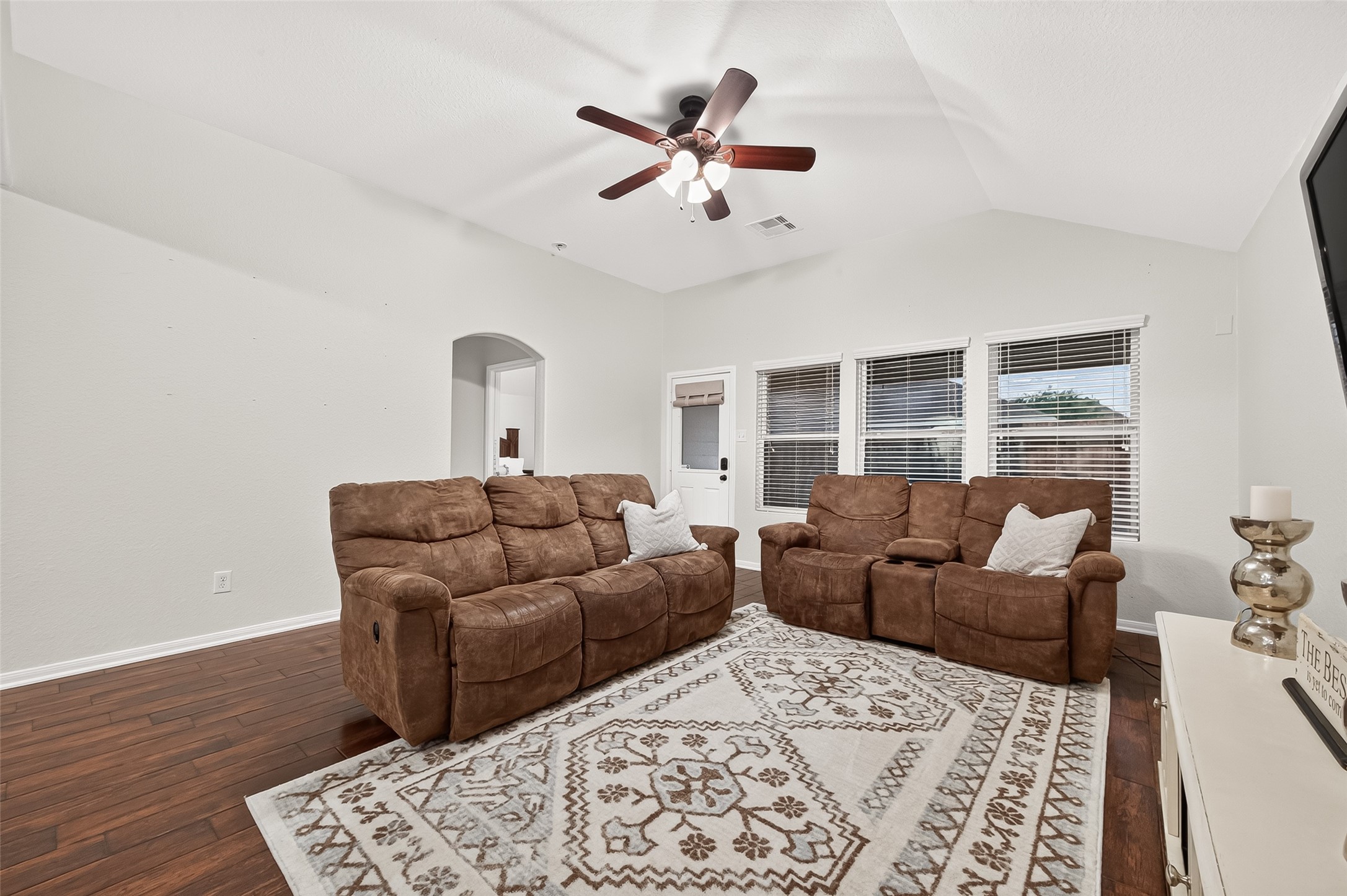 3155 View Valley Trail Katy, TX 77493 - Photo 15 of 50 Grand main living room featuring soaring vaulted ceilings and a ceiling fan, crafted for ultimate comfort and relaxation