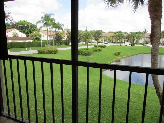 a view of a backyard with a patio