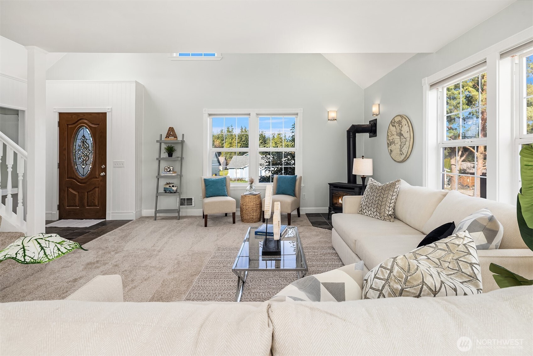 1316 East Backswing Lane Freeland, WA 98249 - Photo 13 of 37 a living room with furniture and large windows