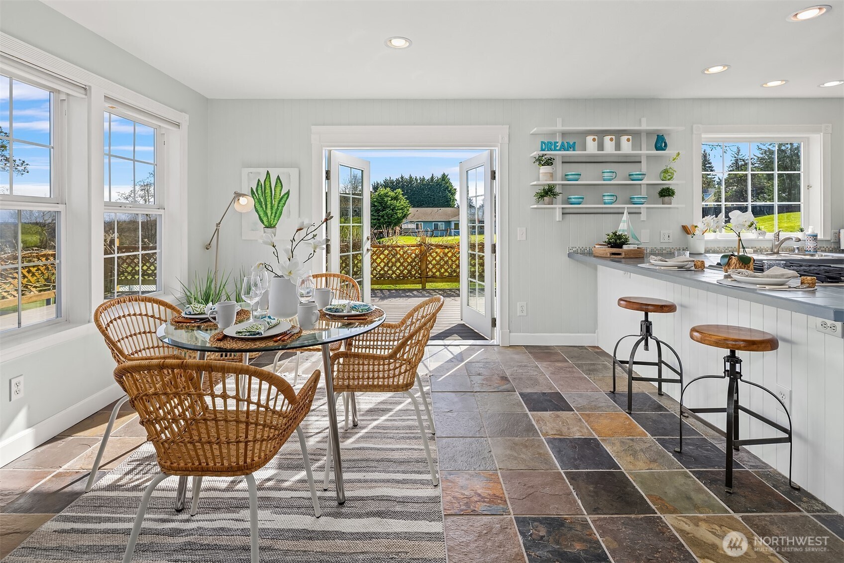 1316 East Backswing Lane Freeland, WA 98249 - Photo 14 of 37 a living room with furniture and a table