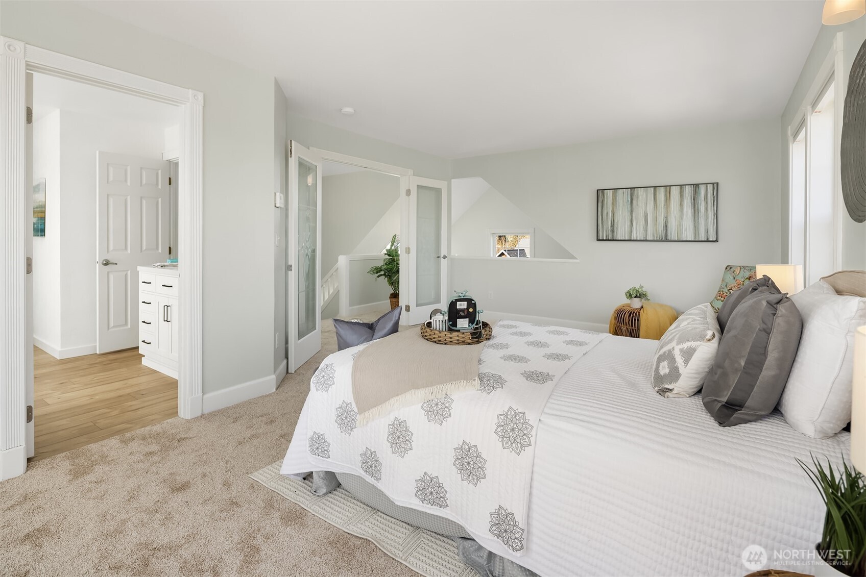 1316 East Backswing Lane Freeland, WA 98249 - Photo 22 of 37 a bedroom with a bed and wooden floor