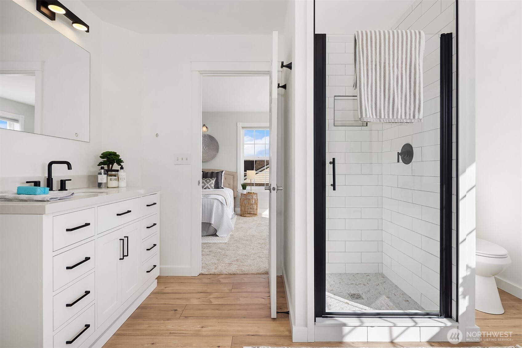 1316 East Backswing Lane Freeland, WA 98249 - Photo 25 of 37 a bathroom with a shower and a sink