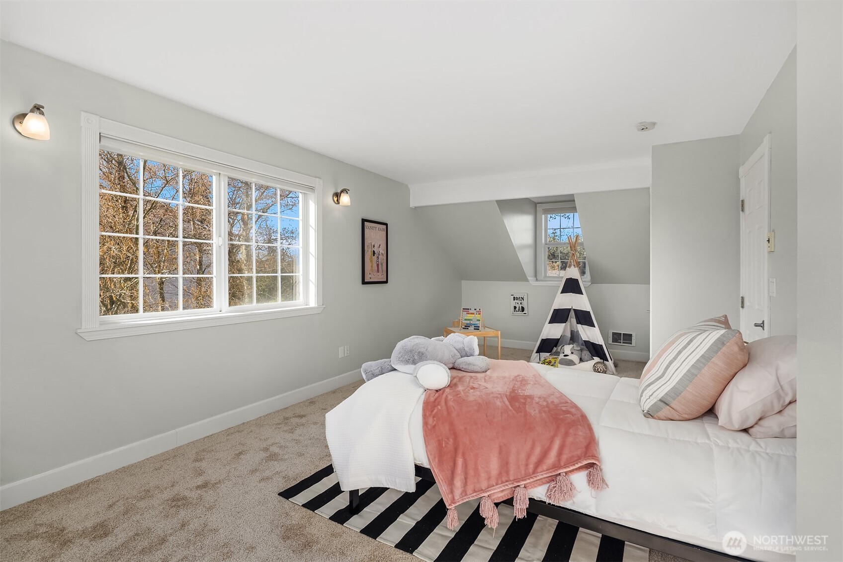 1316 East Backswing Lane Freeland, WA 98249 - Photo 30 of 37 a bedroom with a bed and wooden floor