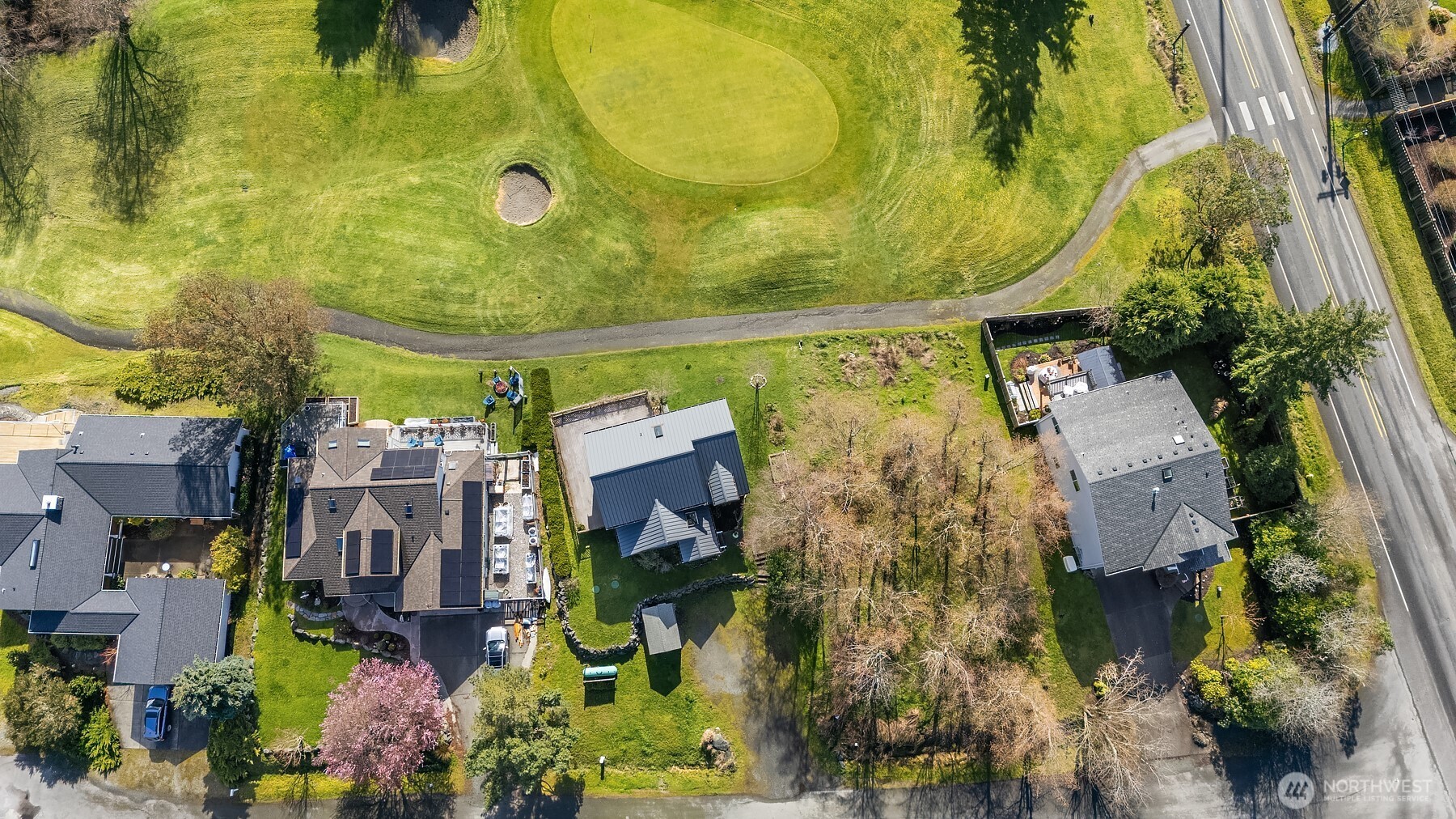 1316 East Backswing Lane Freeland, WA 98249 - Photo 37 of 37 an aerial view of residential houses with outdoor space