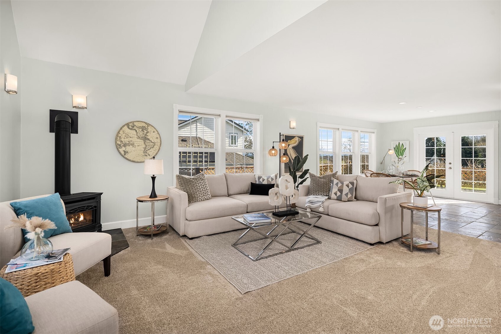 1316 East Backswing Lane Freeland, WA 98249 - Photo 8 of 37 a living room with furniture a clock and a large window