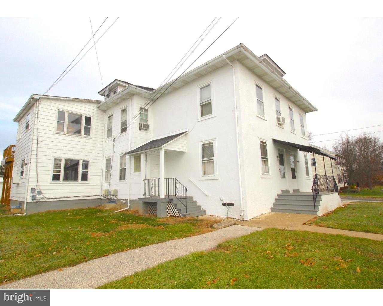 15 Level Road, Unit 3 Collegeville, PA 19426 - Photo 2 of 9 a front view of a house with a yard