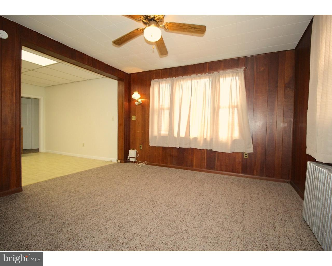 15 Level Road, Unit 3 Collegeville, PA 19426 - Photo 4 of 9 a view of an empty room with a window