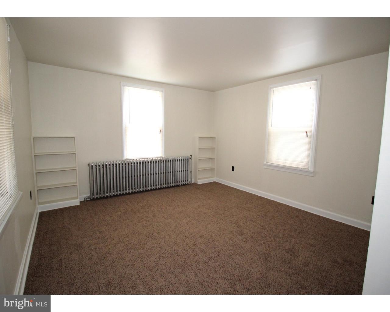 15 Level Road, Unit 3 Collegeville, PA 19426 - Photo 6 of 9 a view of an empty room with a window