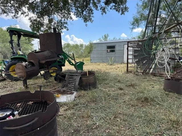 a view of a couches in backyard of the house