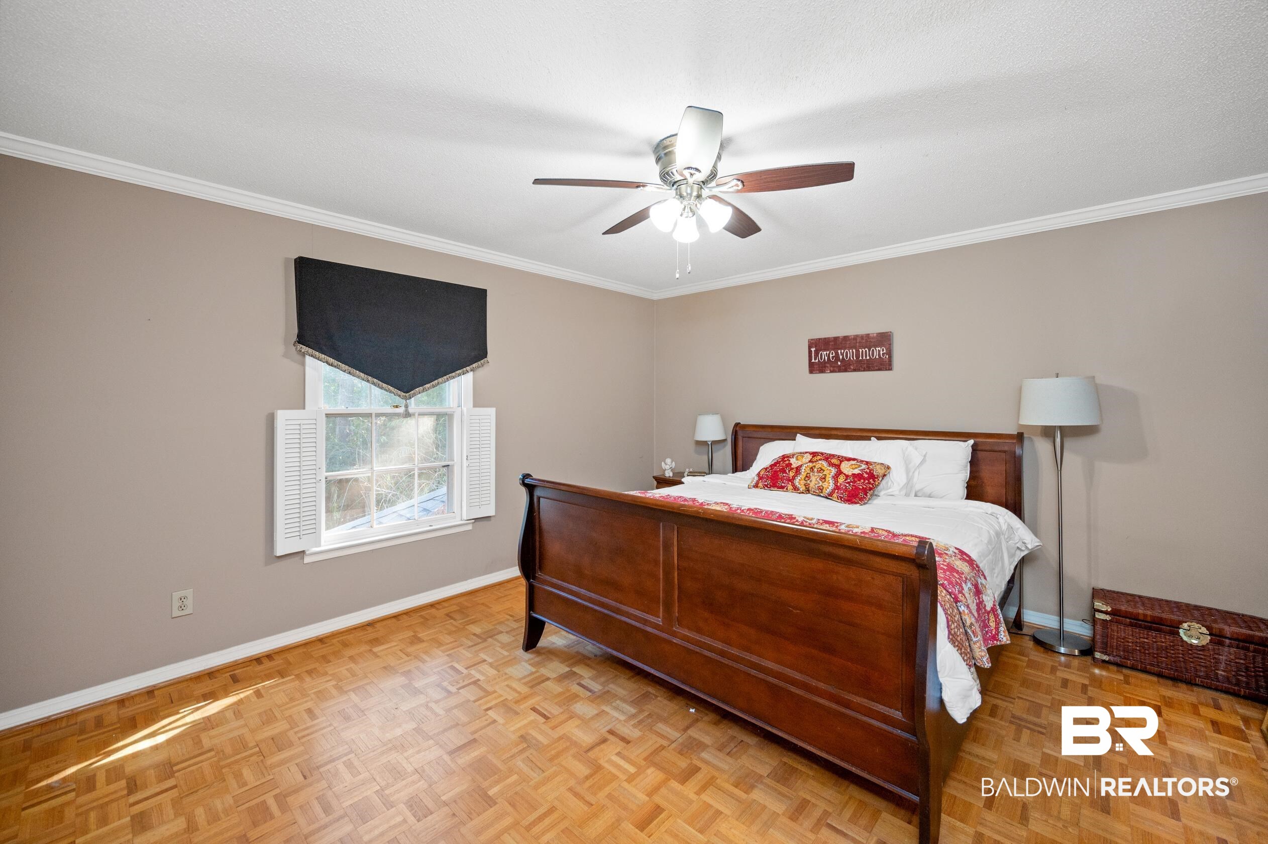 6705 Ridgeland Road South Mobile, AL 36695 - Photo 31 of 44 Bedroom featuring ceiling fan, crown molding, and light parquet floors