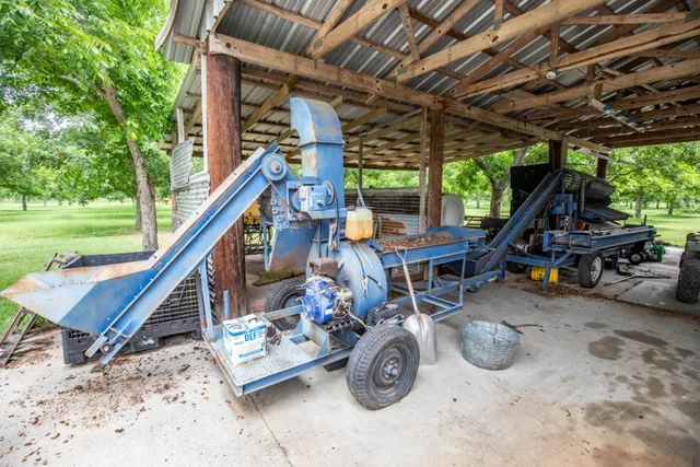 a view of a chairs and table in the patio