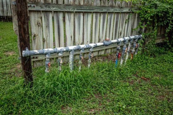 a view of a backyard with a fountain