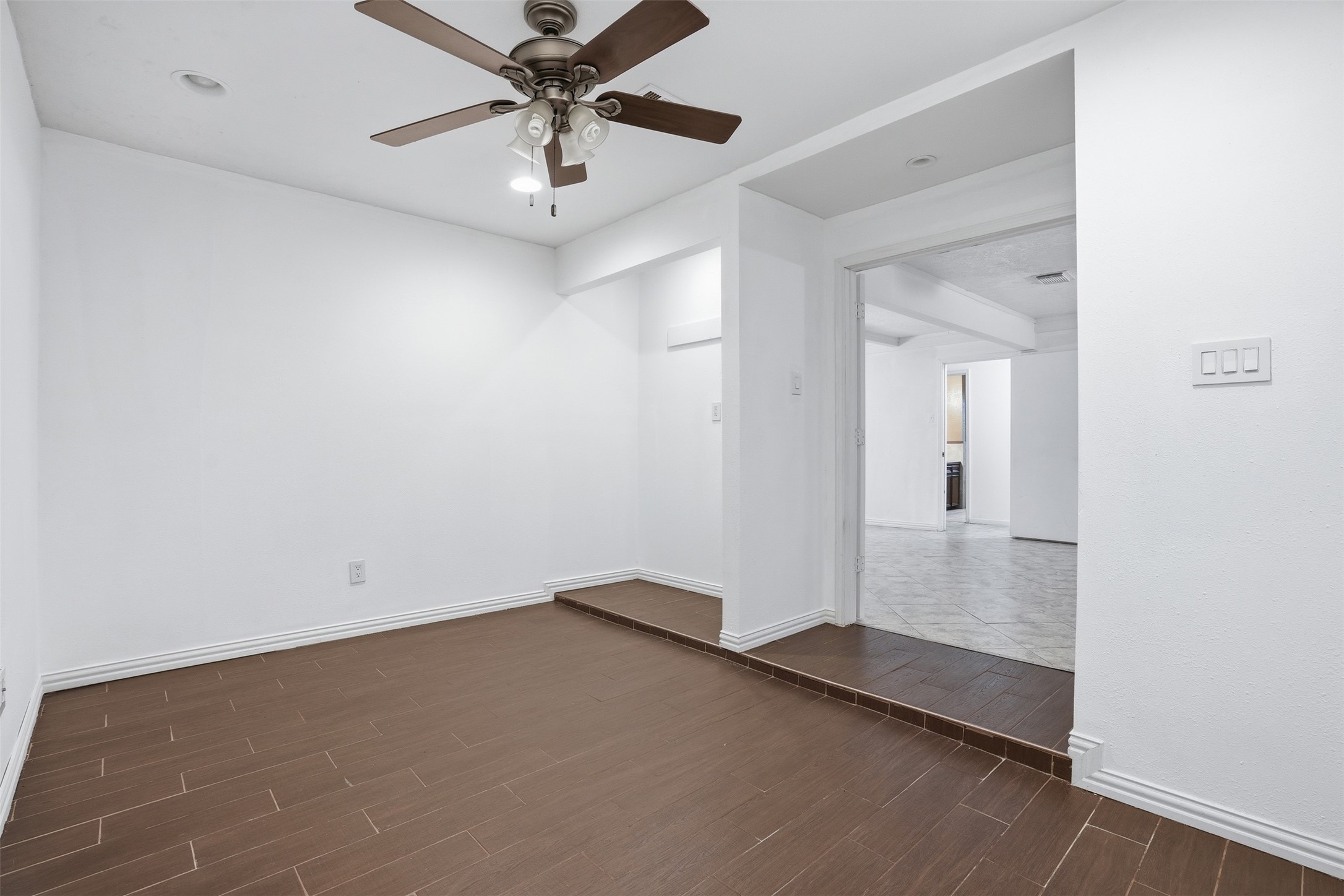2605 Burke Road Pasadena, TX 77502 - Photo 20 of 29 an empty room with chandelier fan