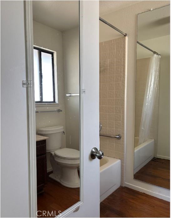 11556 3rd Hesperia, CA 92345 - Photo 17 of 24 a bathroom with a toilet and a shower