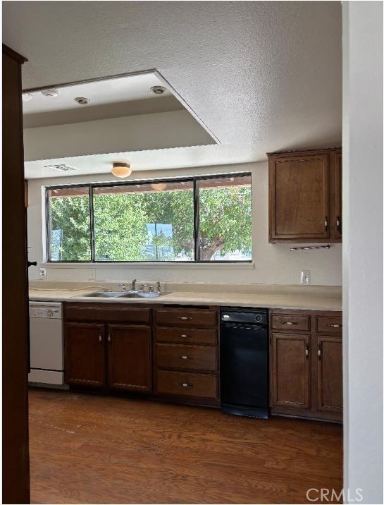 11556 3rd Hesperia, CA 92345 - Photo 6 of 24 a view of granite countertop a sink and a stove
