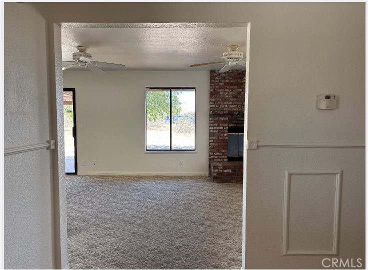 11556 3rd Hesperia, CA 92345 - Photo 10 of 24 a view of an empty room with a window