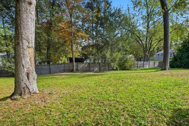 a view of a garden with basketball court